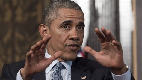 Obama talks about racism, drops the 'n word'