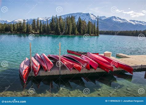 Red Canoes On Dock At Lake Louise Alberta Royalty Free Stock