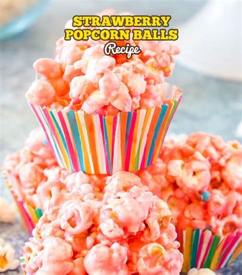 Some Pink Popcorn Balls Are Stacked On Top Of Each Other With The Words