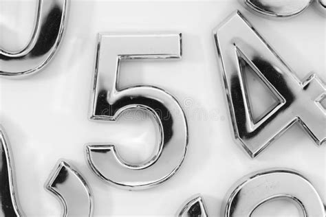 Silver Scattered Numbers On The Table For Mathematics Stock Image
