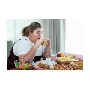 Asian Fat Girl Hungry And Eat A Junk Food On The Table Photograph By