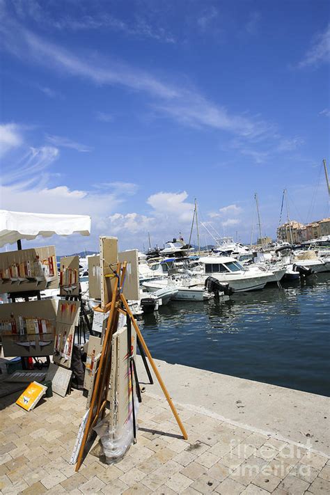 You can rent skippered or bareboats. Saint-Tropez, Yacht club and Marina Photograph by Oren Shalev