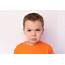Cute Little Boy With Sad Face Against A Bright Background Stock Image 