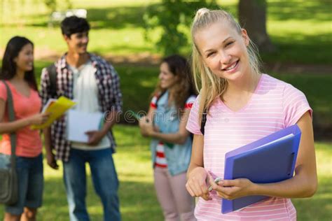 Girl With College Friends In Background At Campus Stock Image Image