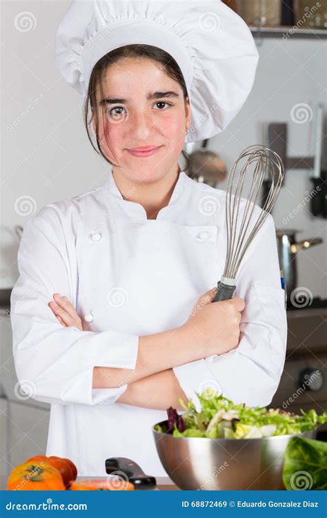 Teen Girl Kitchen Preparing Salad 68872469 