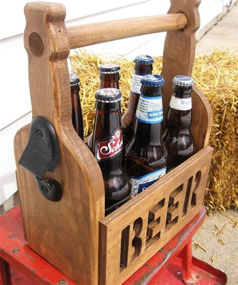 This woodworking project is great for batching out and selling at craft fairs and also makes a great handmade gift!get. Beer Tote Beer Caddy 6 Pack Carrier Unique by DimeStoreVintage | Woodworking projects, Wood ...