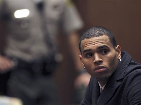 Chris Brown Back In Court Over 2009 Beating Rihanna With Him Blows Kiss Cbs News