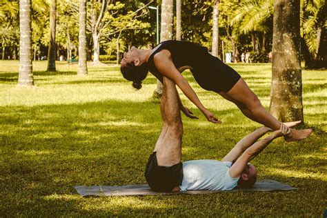5 Couples Yoga Poses That Will Strengthen Your Relationship Partner