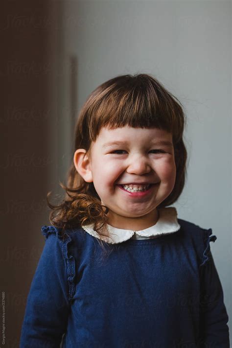 Portrait Of An Adorable Toddler Girl Del Colaborador De Stocksy