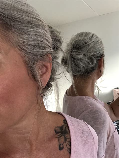Low Grey Messy Bun Transitioning Hairstyles Long Gray Hair Grey