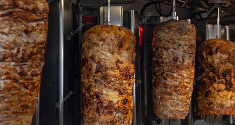Premium Photo Gyros Doner Grilled Slowly On Rotating Spits