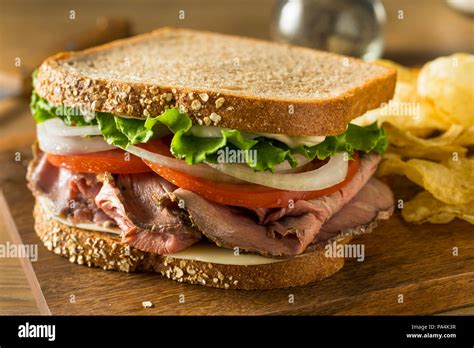 Homemade Roast Beef Deli Sandwich With Lettuce And Tomato Stock Photo