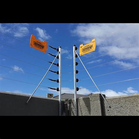 An electric fence is a barrier that uses electric shocks to deter animals and people from crossing a boundary. Electric Fence - Titan System