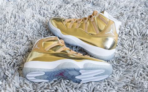 Ovo X Air Jordan 11 Sample Surfaces In Shiny Metallic Gold House Of Heat