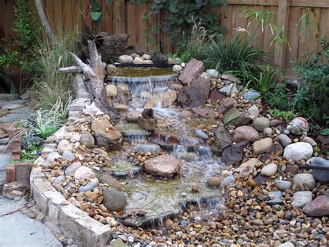 To install a pondless waterfall, you will need to excavate for the stream, cut and lay a flexible liner, and position stones for the waterfall. Pondless Waterfall - Modern - Landscape - Dallas - by Cozy ...
