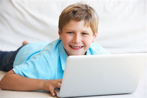 Young Boy On His Laptop Computer Stock Image Image Of Laptop Indoors