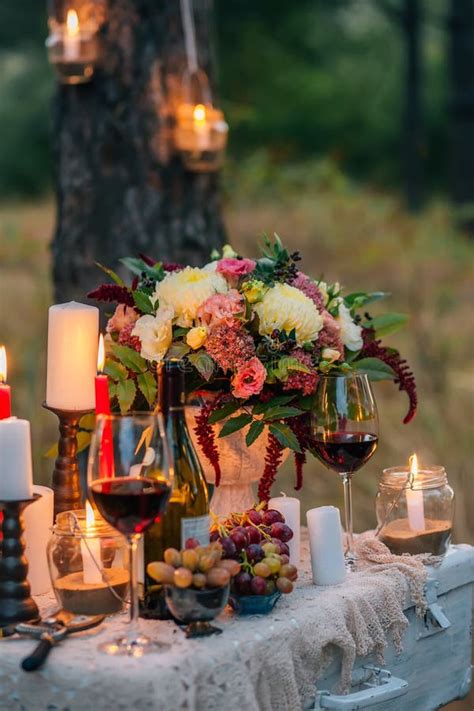 Wedding Decor With Glasses Flowers Vases Candles And Fruit O Stock