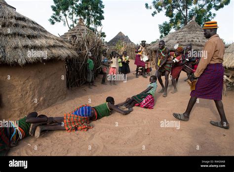 Traditional Game Playing In A Karamojong Village Northern Uganda Stock