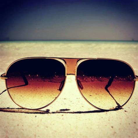 Sunglasses On Beach Photograph By Smita Shitole
