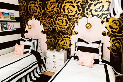 The black bedstead is completed by black bed cover and pillow cover with the floral patterned motif. Black and Gold Girls Bedroom