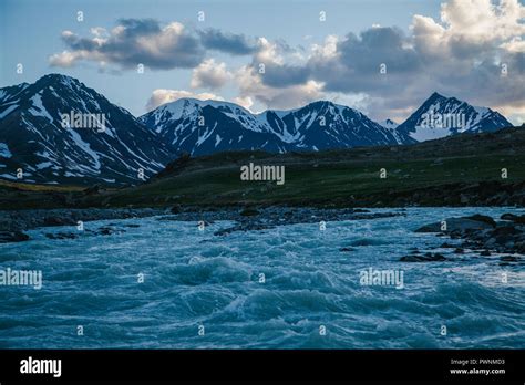 Landscape With Milky White Glacial River Flowing Down From The Tavan
