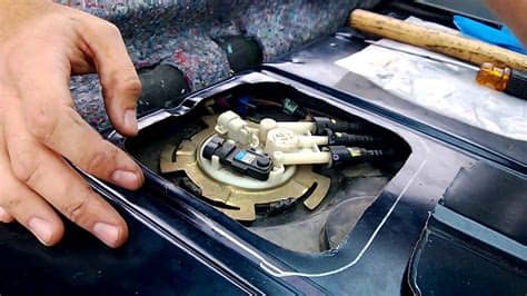 Cutting Fuel Pump Access Panel and Removing Fuel Pump ...