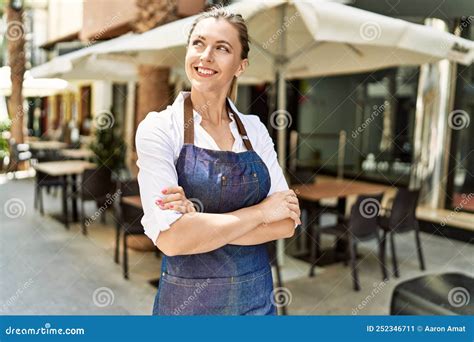 Beautiful Blonde Woman Waitress Standing At Restaurant Smiling Happy Stock Image Image Of