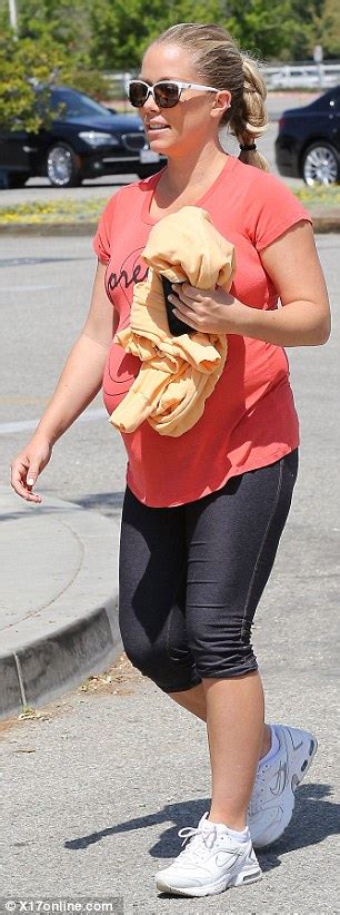 Kendra Wilkinson Displays Heavily Pregnant Belly While Taking Her Son