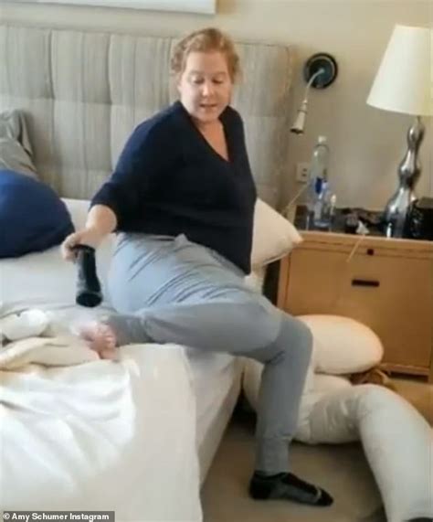Amy Schumer Teaches Fans How To Put On Socks While Pregnant Then Heads To FedEx