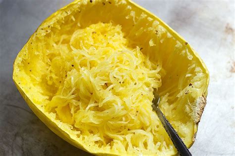 Halved and baked in a 400 degree f oven, the squash is tender and ready in about 40 minutes. how to cook spaghetti squash in oven — Eatwell101