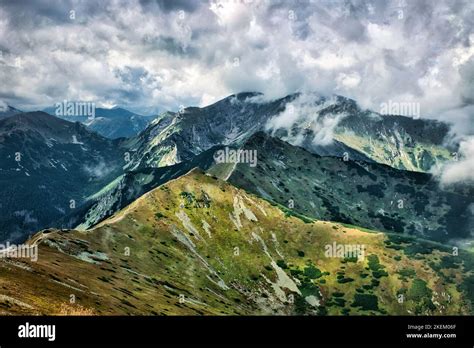 Clouds Over Tatra National Park Mountain Rocky Trail With Massive