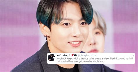 did bts jungkook add to his tiger lily tattoo these photos have fans convinced