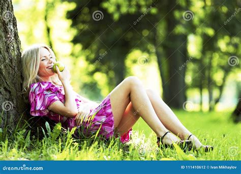 Woman Sitting Under Tree Stock Photo Image Of Female 111410612