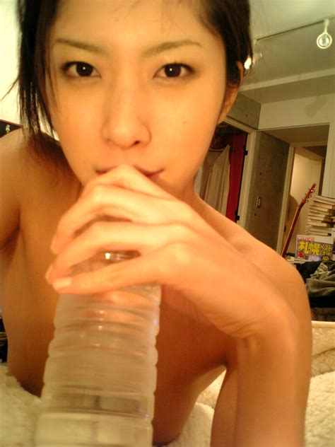 Tachibana Riko Highres Photo Medium 1girl Asian Blanket Bottle Indoors Looking At
