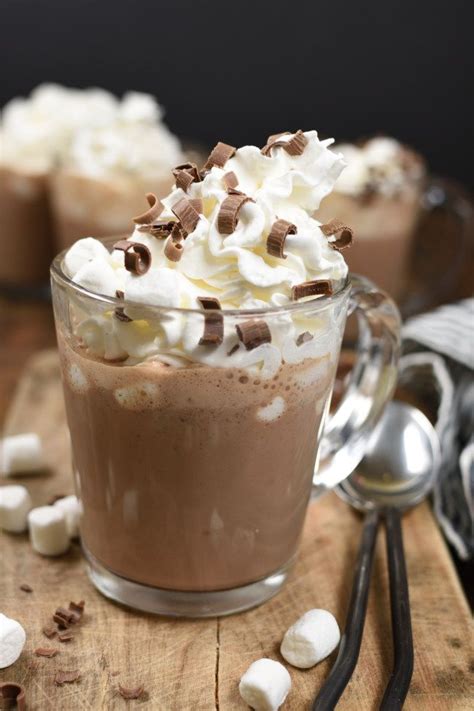 Evenly divide hot chocolate between the two cups, and top with whipped cream and chocolate shavings. Slow Cooker Hot Chocolate an extra creamy and rich hot cocoa recipe made with real milk ...