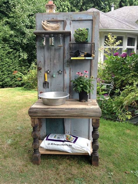 Cute Idea Old Door And Table For A Potting Station Old Wooden Doors