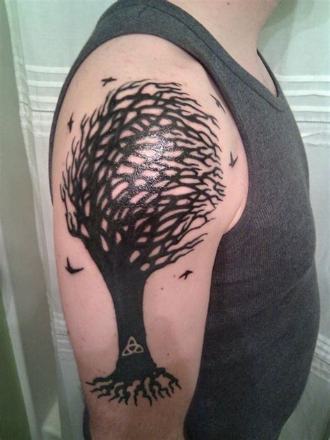 Tree Turning Into Birds Tattoo