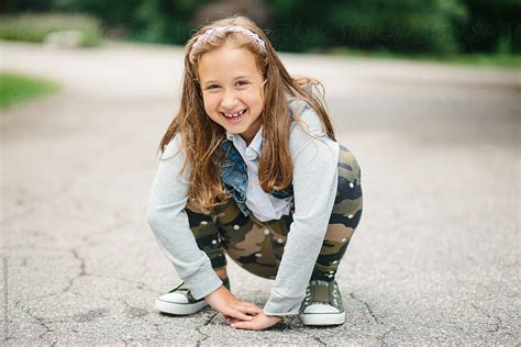 Portrait Of A Cute Young Girl In A Hooded Denim Jacket Del Colaborador De Stocksy Jakob