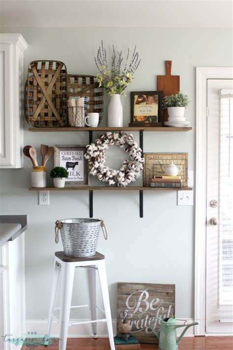 The small bathroom decor idea frees up floor space and gives the room a more open appearance. Decorating Shelves in a Farmhouse Kitchen