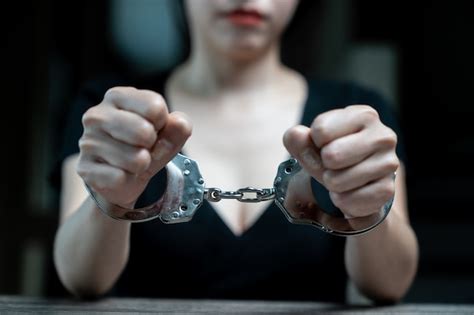 Premium Photo Handcuffed On A Prisoner Woman Prisoners Were Handcuff In The Dark Prison