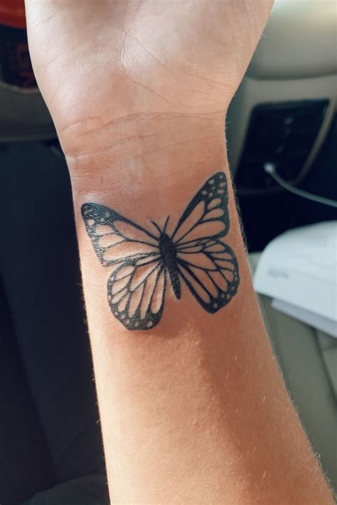 Butterflies Tattoos On Wrist Sacred Tattoo