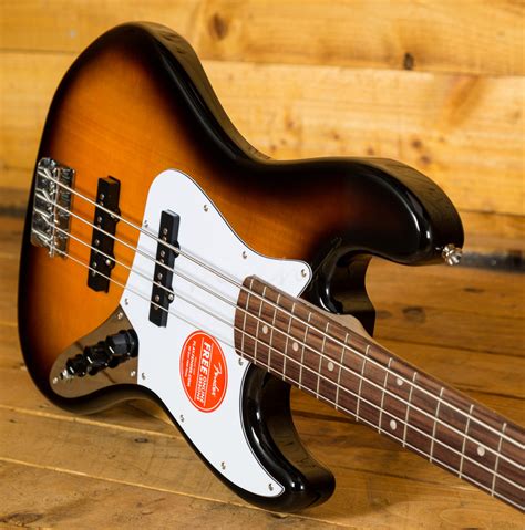 Squier Affinity Jazz Bass Brown Sunburst Peach Guitars