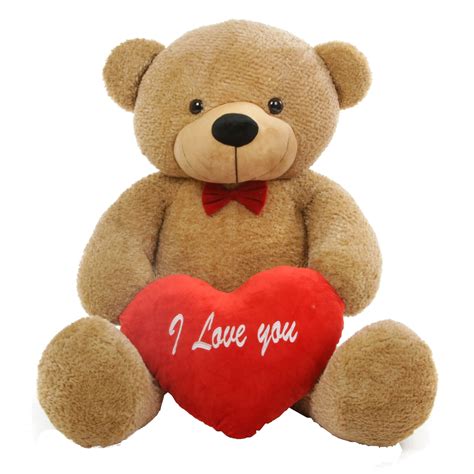 A Teddy Bear Holding A Red Heart With The Words I Love You Written On It