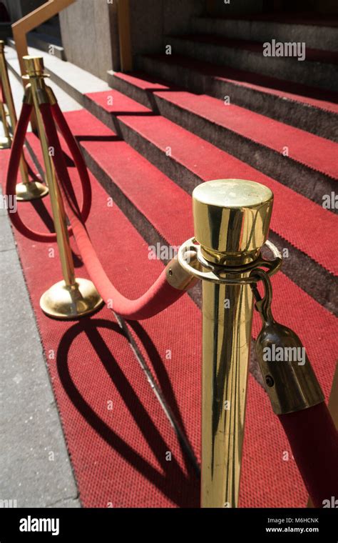 Brass Stanchions And Velvet Ropes Guard Red Carpet Steps New York City