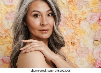 Mature Topless Woman Standing Posing Over Stock Photo