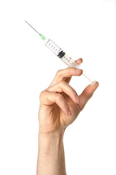 50400 Hands Holding Syringes Stock Photos Pictures And Royalty Free