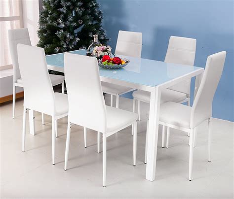 Dining chairs don't just have to look good, but should feel good, too. Spend Your Precious Time in White Dining Table and Chairs