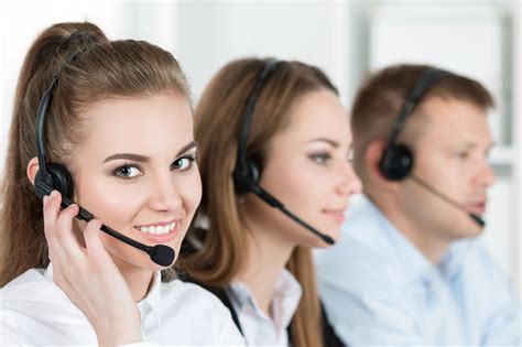 Portrait Of Call Center Worker Accompanied By Her Team Emerging Europe