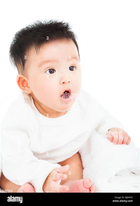 Cute Baby Making A Funny Surprised Face Stock Photo Alamy