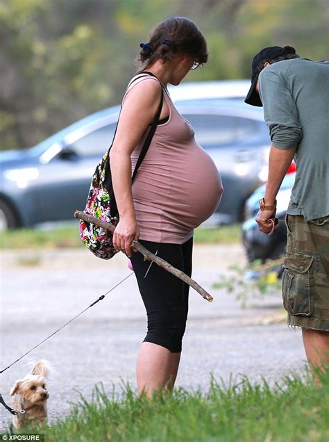 Milla Jovovich Proudly Displays Her Burgeoning Bump On Another Hike